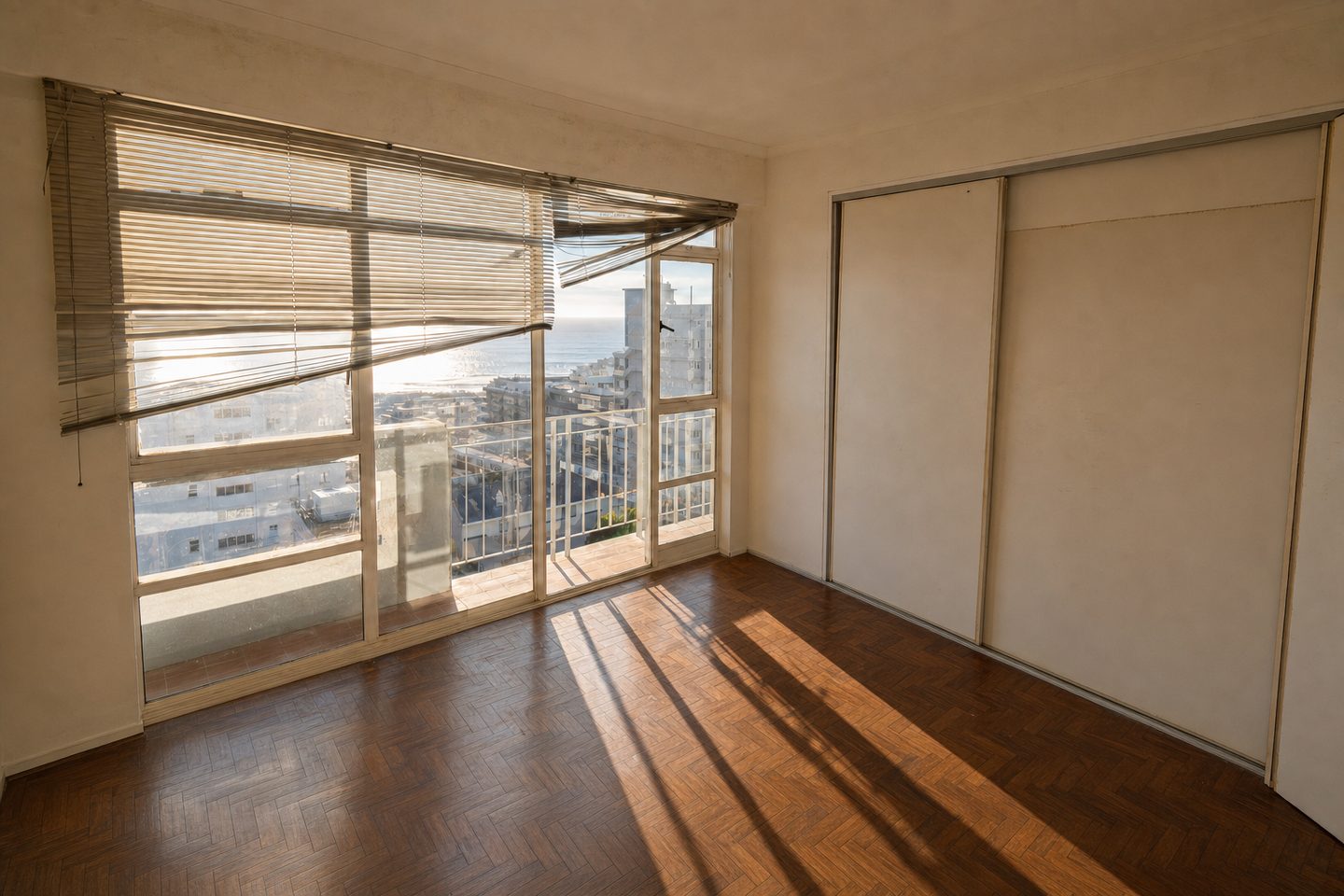 Sectional-title flat bedroom, Sea Point — Decluttered