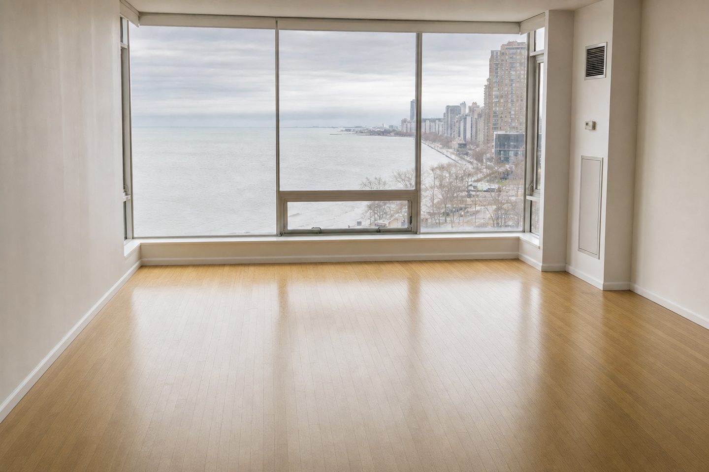Lakefront condo living room, Lakeview — Decluttered