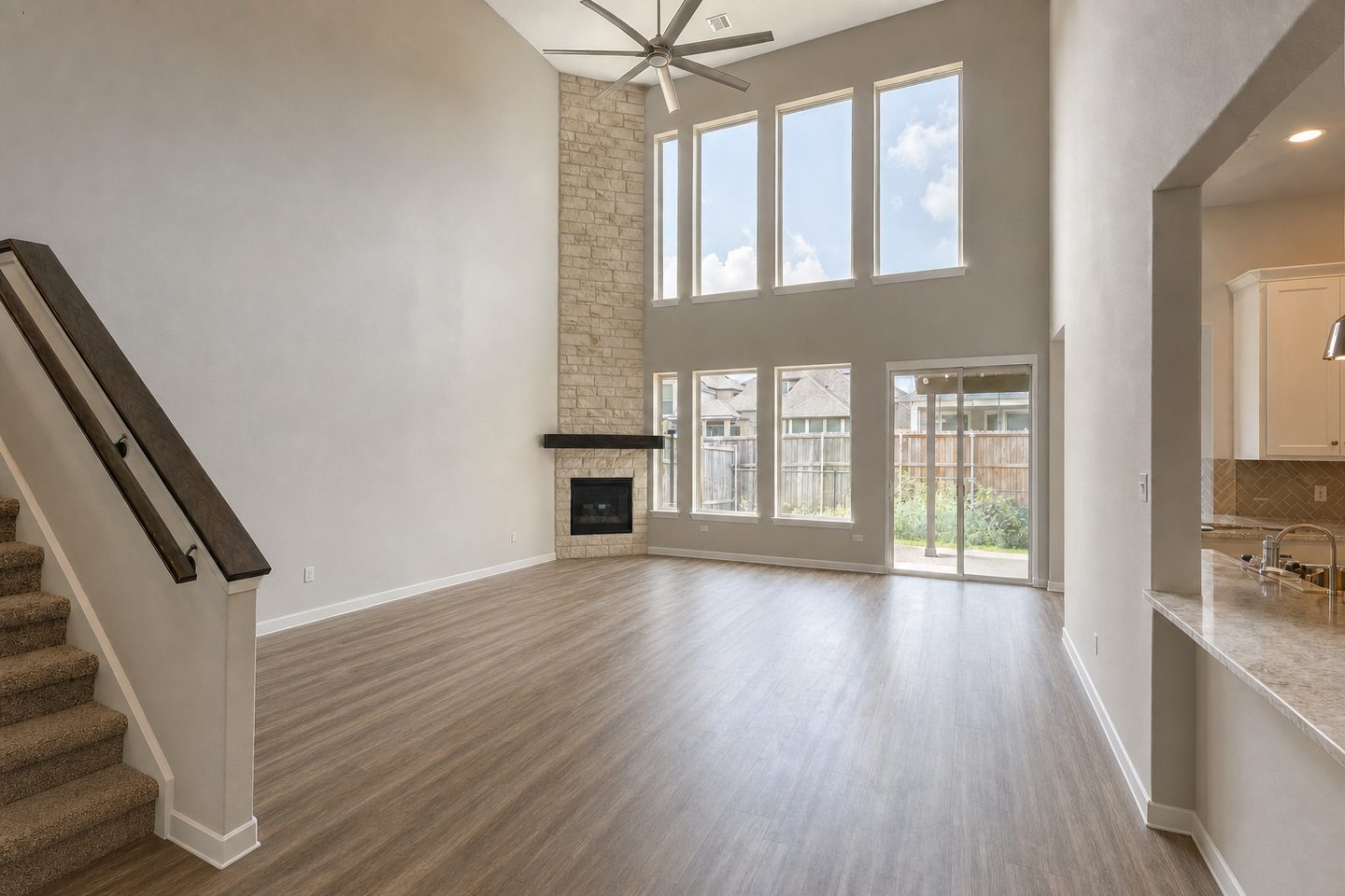 Spec-home family room, Katy — Decluttered