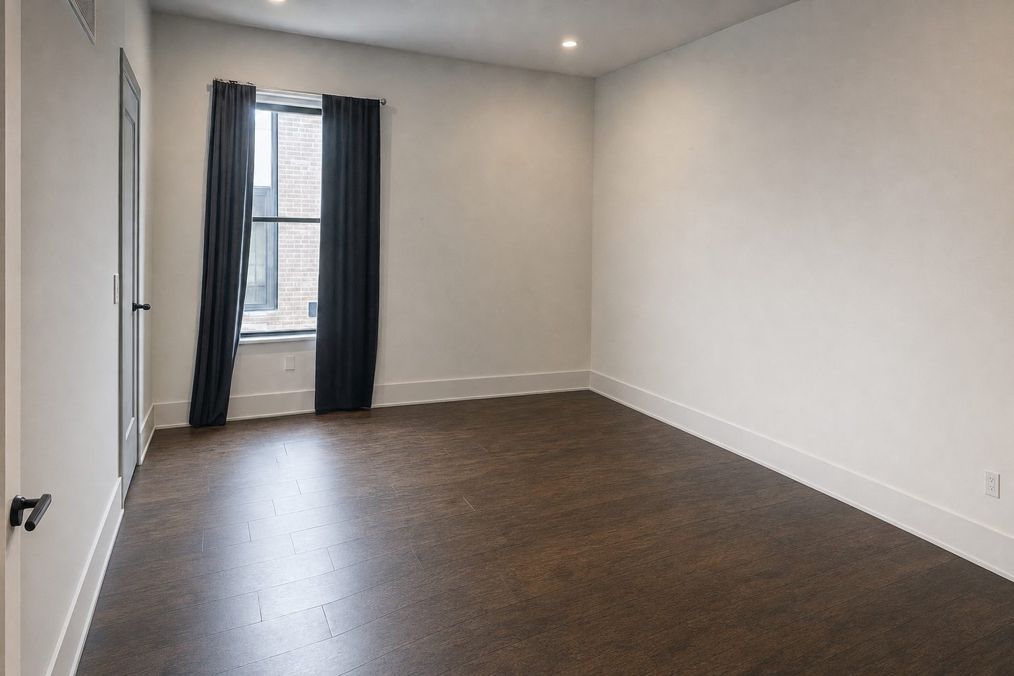 Townhome primary bedroom, EaDo — Decluttered