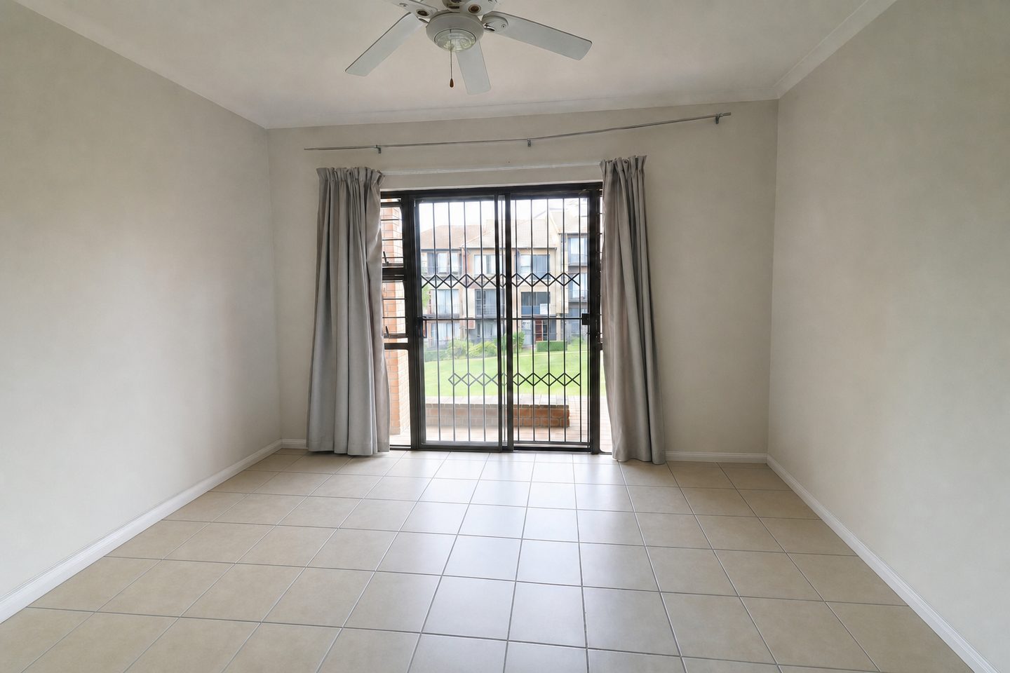 Main bedroom, Midrand townhouse — Decluttered