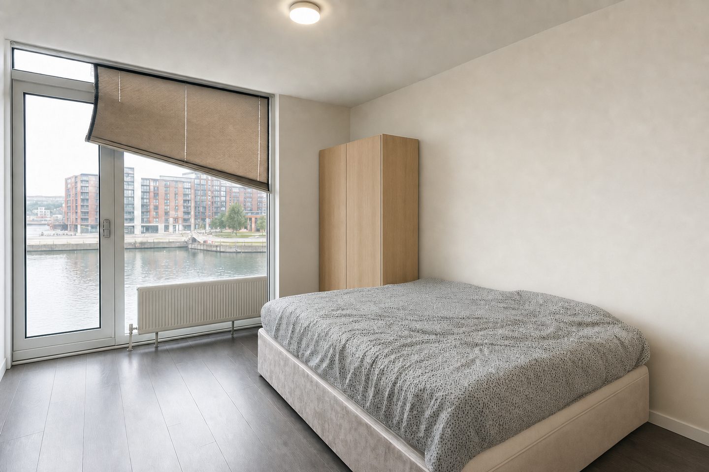 Waterside flat bedroom, Leeds Dock — Decluttered