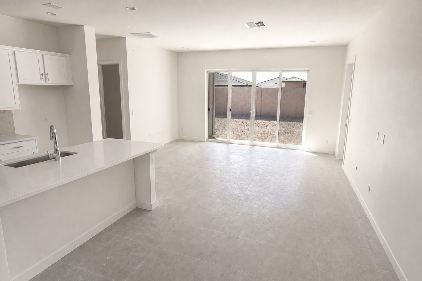 New-build great room, Laveen — Decluttered