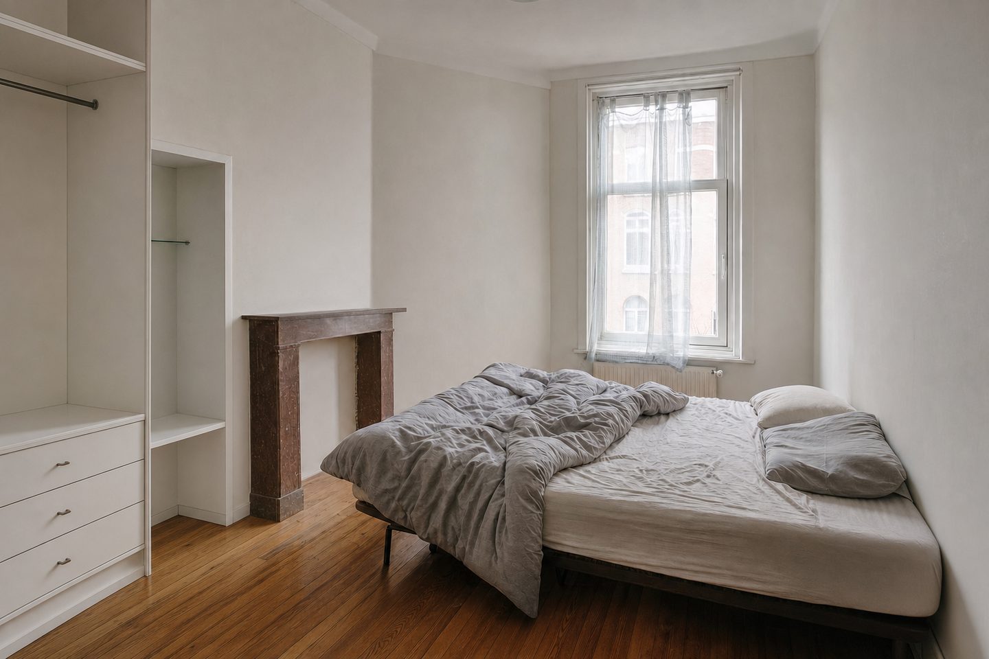 A compact city bedroom with an alcove — Decluttered