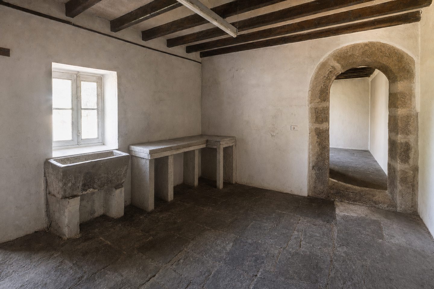 A farmhouse kitchen with a stone arch — Decluttered