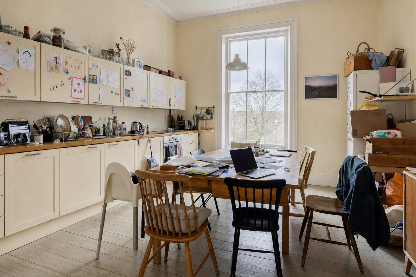 A tall old kitchen with room for a table — Original