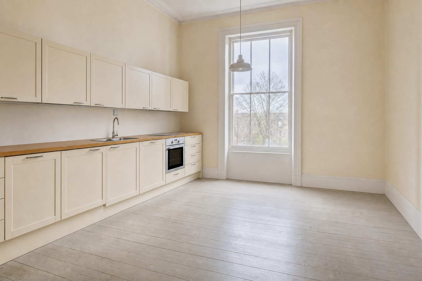 A tall old kitchen with room for a table — Decluttered