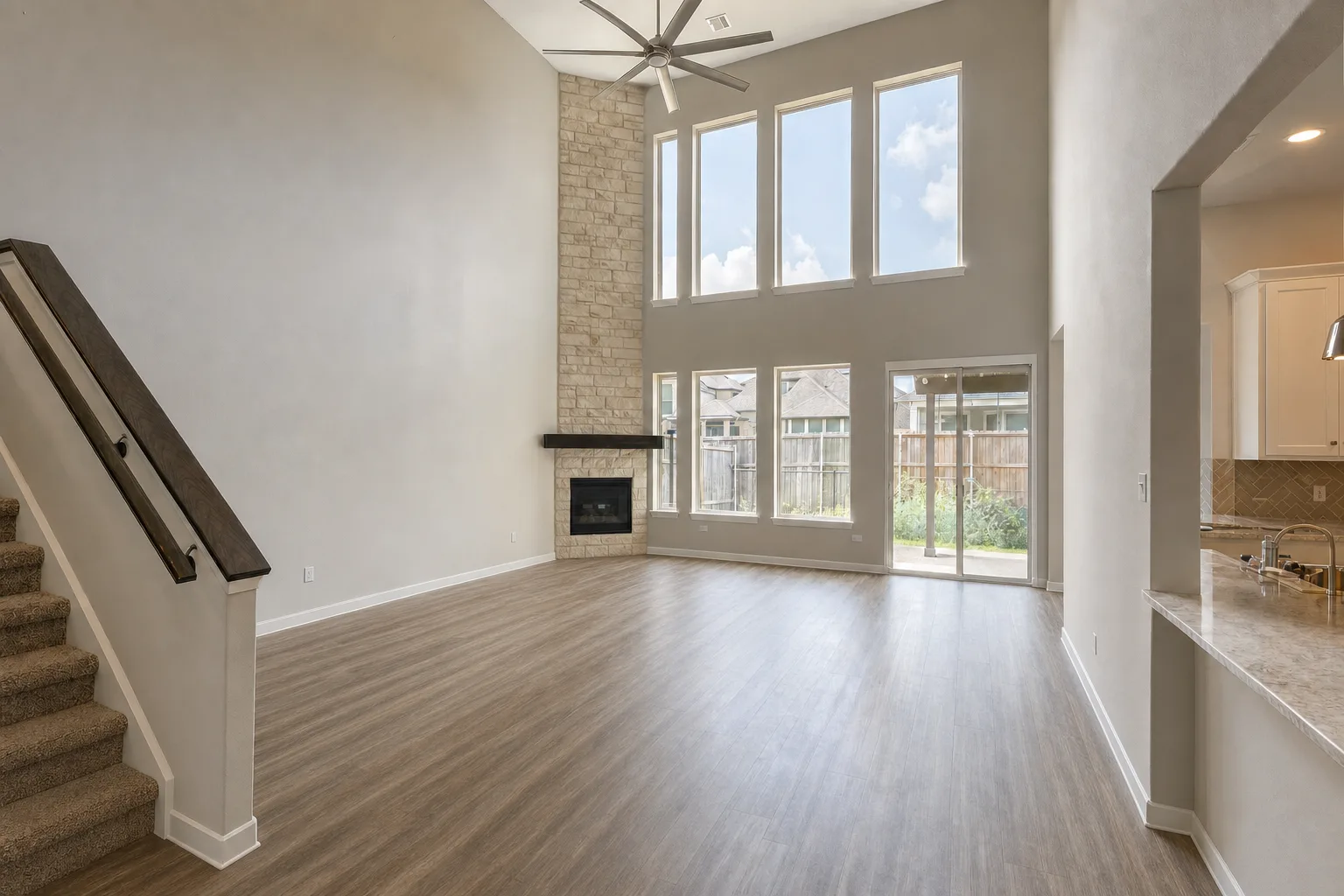 Spec-home family room, Katy — Decluttered