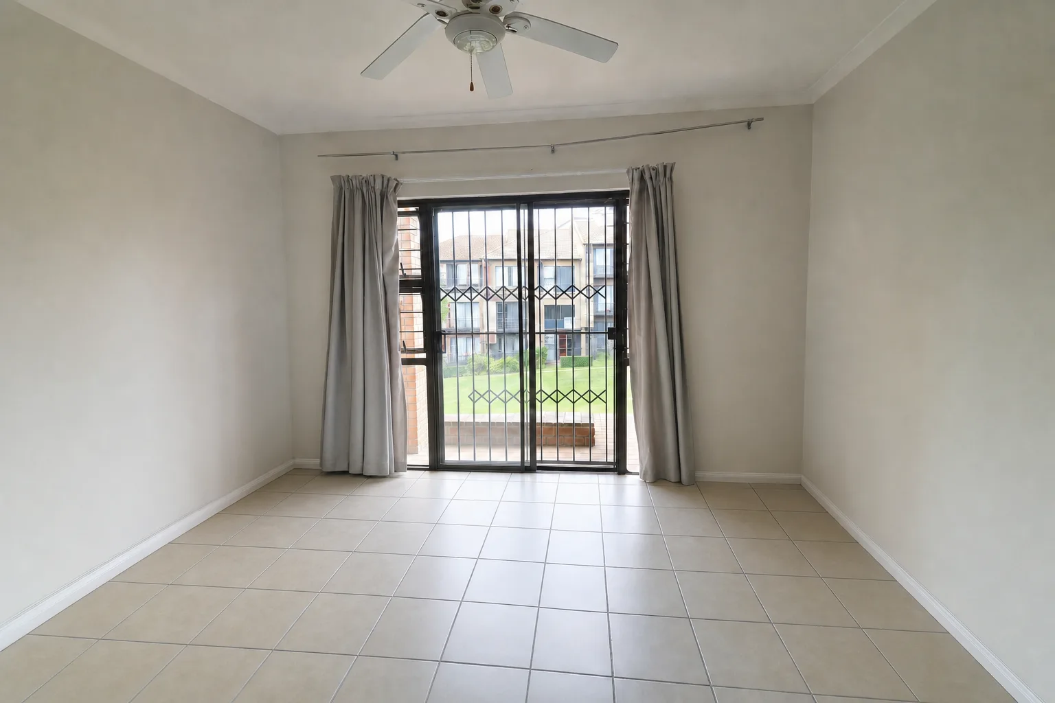 Main bedroom, Midrand townhouse — Decluttered