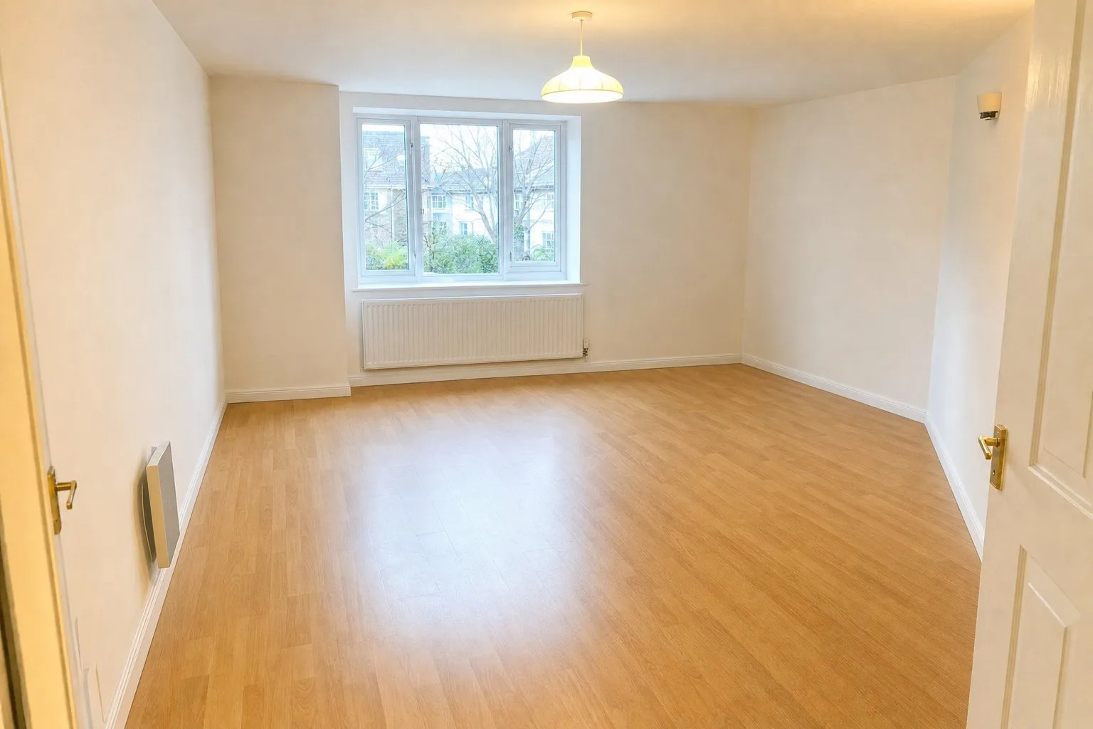 Living room before and after virtual decluttering — After