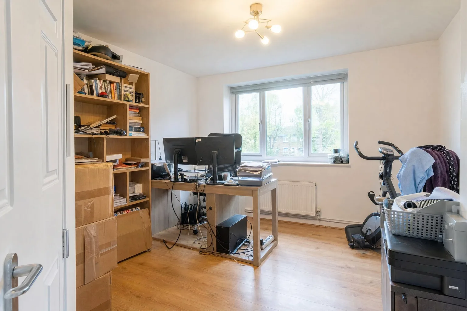 Home office before and after decluttering — Before