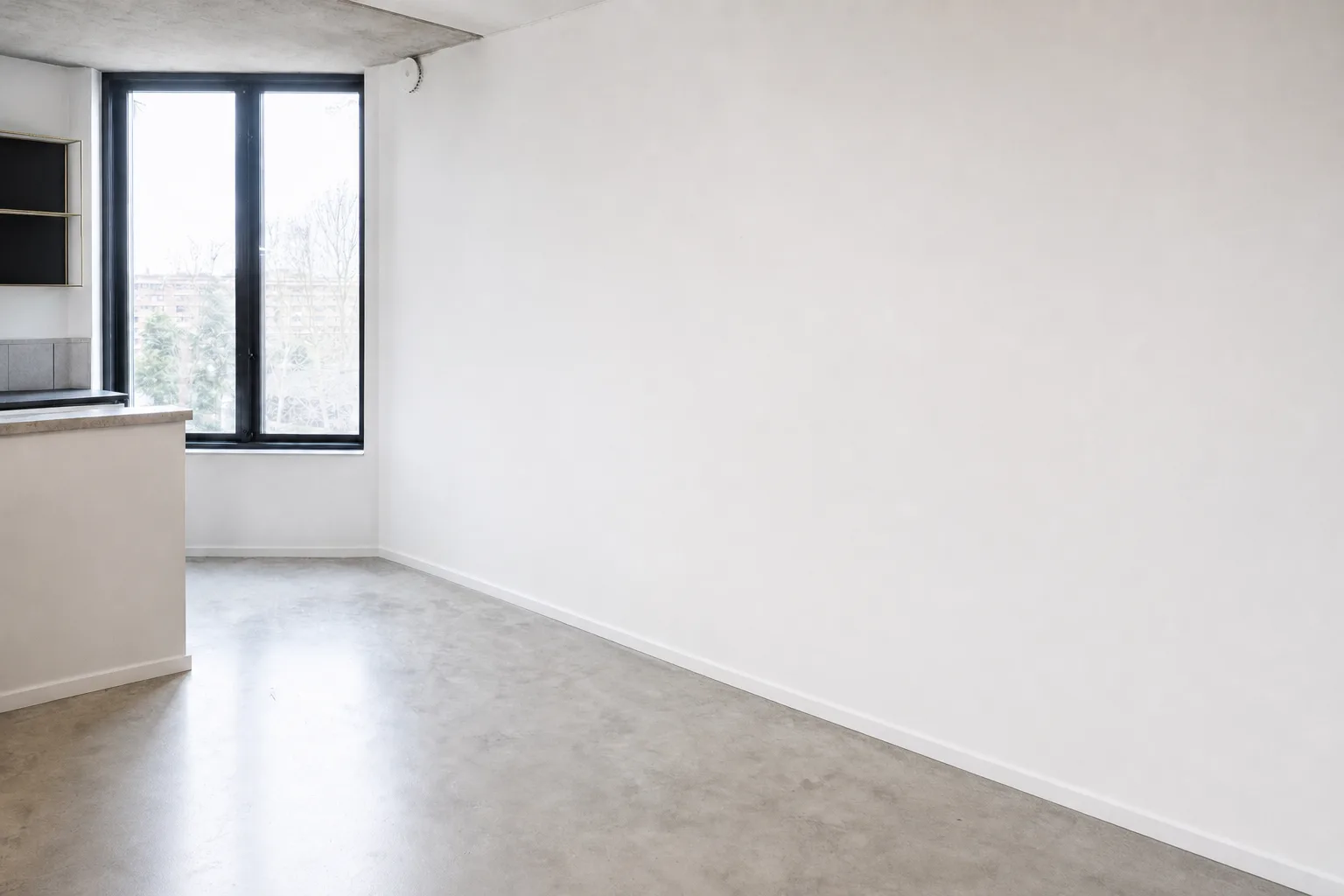 A work corner in an open-plan apartment — Decluttered