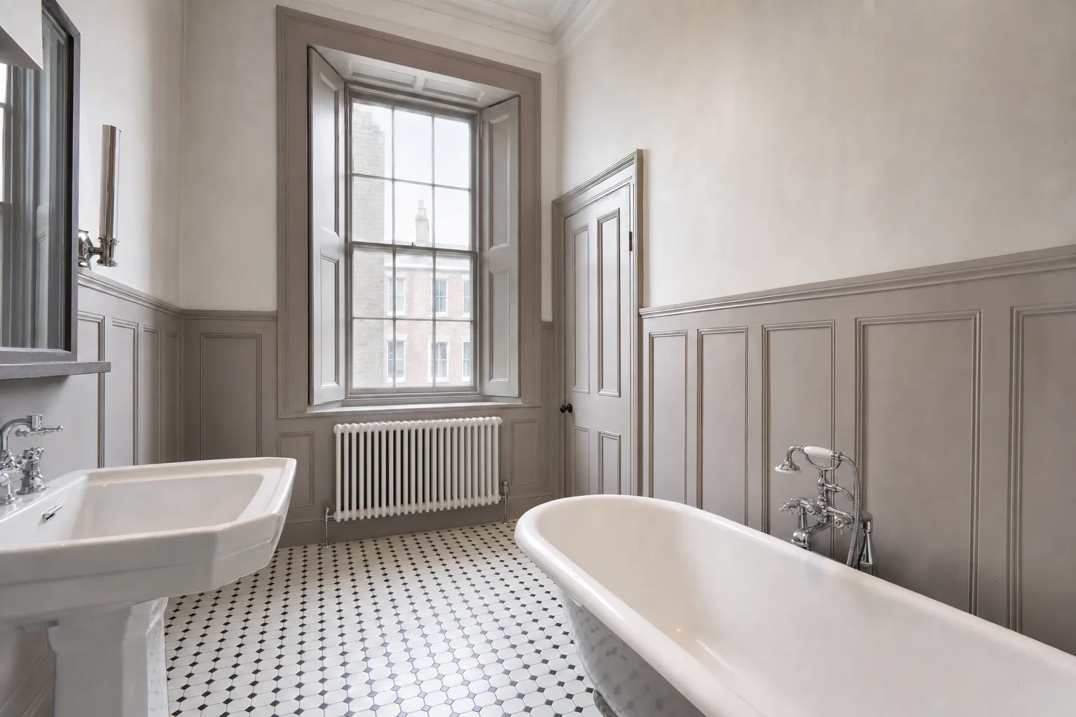 A period house bathroom with a pedestal basin and old shutters — Decluttered