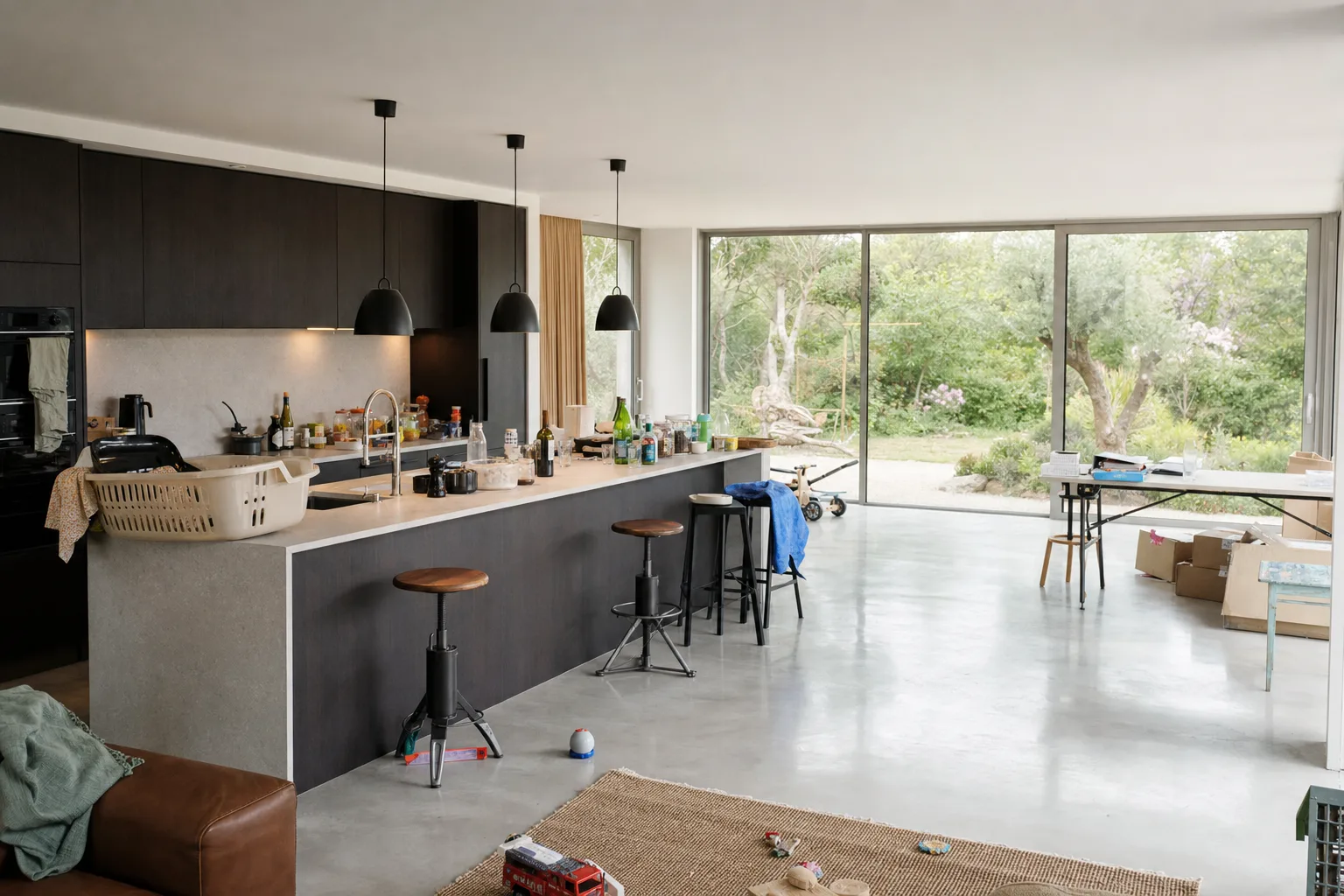 An open-plan kitchen behind floor-to-ceiling glass — Original